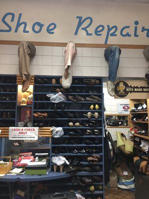 Corte Madeira Shoe Repair in the mall between Veggie Grill and Rite Aid.