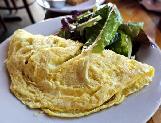 Three egg omelet with mixed greens