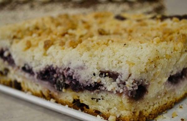 Cherry cheese crumb cake baked fresh at M&W European Deli. Perfect treat with coffee or tea.