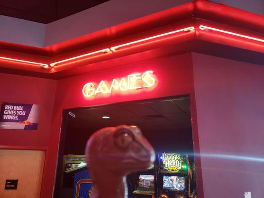 Bob the Raptor says "While you wait for the movie there are arcade games and stuff."