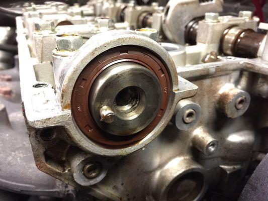 A leaking camshaft seal in a 1997 Eagle Talon.