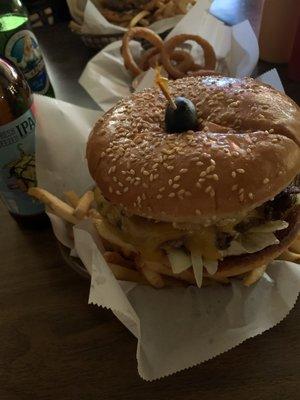 Double cheeseburger with bacon, jalapeño and house sauce. Comes w/ fries. Onion rings and beer extra...