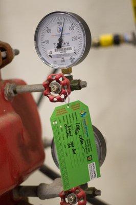 Fire Protection Services custom green tags for fire sprinkler system inspections.