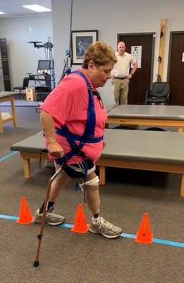 A patient doing gait training in our harness system.