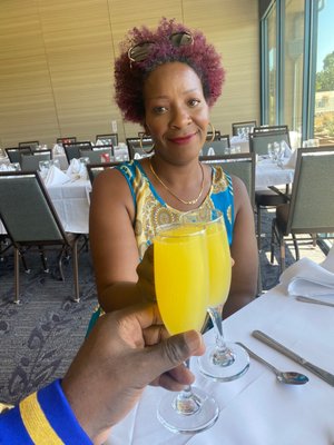 The Mrs and I getting the mimosas going.