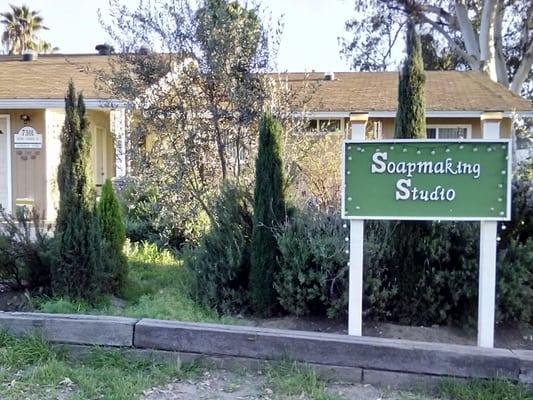 The aromatic plant garden in front of the Soapmaking Studio. Plants are distilled for essential oil and dried to put in soap.