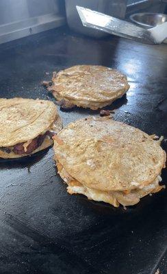 Mulitas $4 each or 3 for $10. Two large yellow  tortillas smothered with Monterrey jack  and your choice of meats