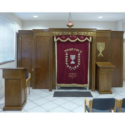 Bet Midrash furnishings were custom designed, built, and installed by Bass Synagogue Furniture.