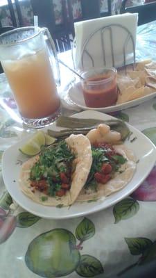 Fresh tacos and aqua fresca con tamarindo.