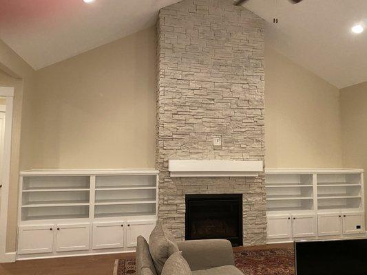 Interior 
Prime and painted cabinets & white washed fire place