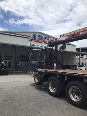 Front of store & company delivery truck