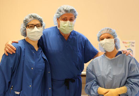 Dr. Makris with surgical staff