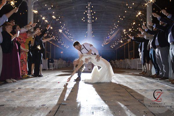 Bride and groom sparkler exit