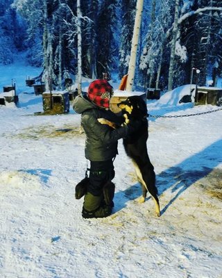 My son thanking one of his dogs for the adventure of a lifetime!