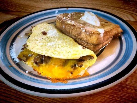 Steak and cheese omelette with French toast