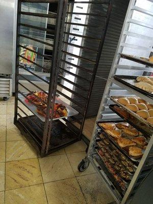 Warm bread and roscas just coming out of oven