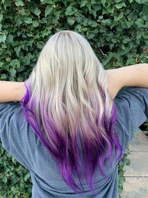 Vibrant purple tips done by Emilee Thing