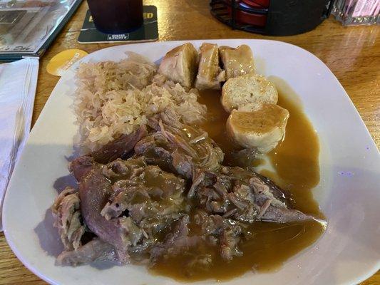 Roast pork, dumplings, and sauerkraut.