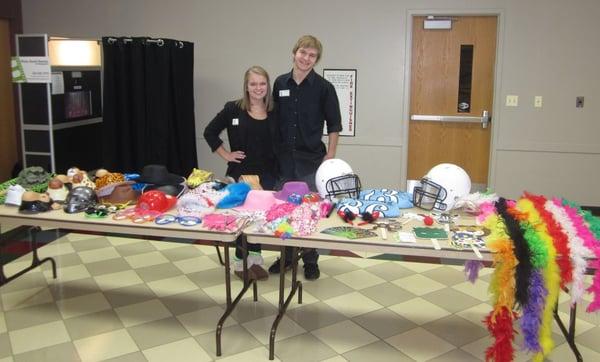 Jessie and Conrad Frank take their photo booth to an event. Party goers choose from a variety of fun costumes!