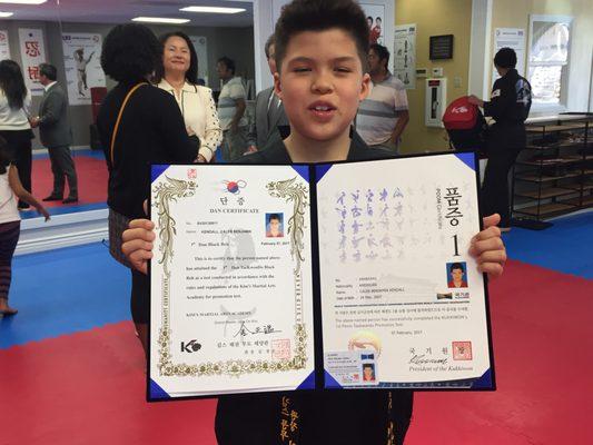 Our son, at the KM2A black belt ceremony. A proud moment for us and him!