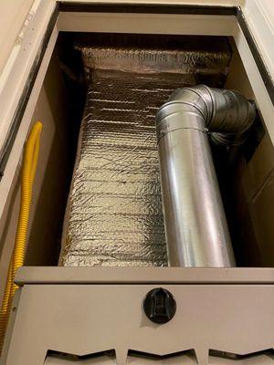 New Furnace in Condo looking up in the closet.