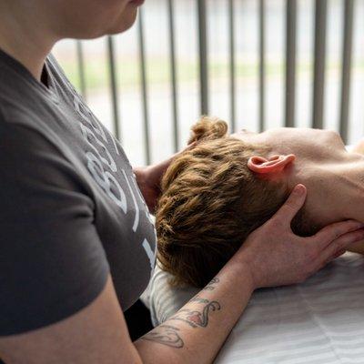 Tabitha performing neck work.