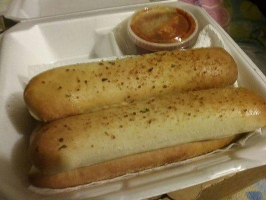 5 cheese stuffed breadsticks with a cup of marinara topped with cheese $6.99