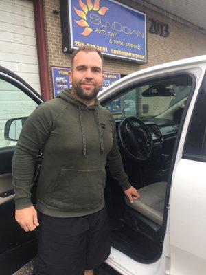 Mr. Bailey getting the keys after we treated his Ford Ranger with our anti-microbial protectant