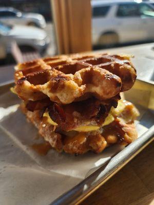 Bacon, egg and cheese waffle sandwich