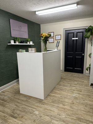 Our reception and retail area. Shop our feminine and skin care products.