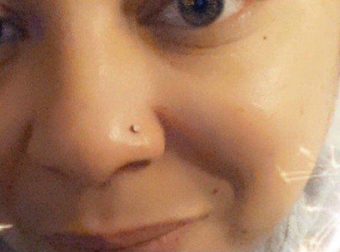 Nose piercing by Leah at Wizard World