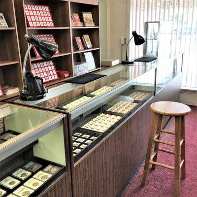 The Coin Market provides seating and plenty of light for the coin store's customers.