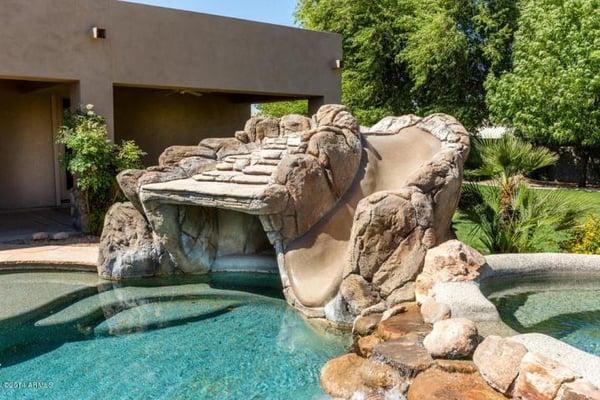 What kid wouldn't want this slide in their backyard! Prestigious Circle G home for sale in Chandler only $809,900 for 4148 sq...