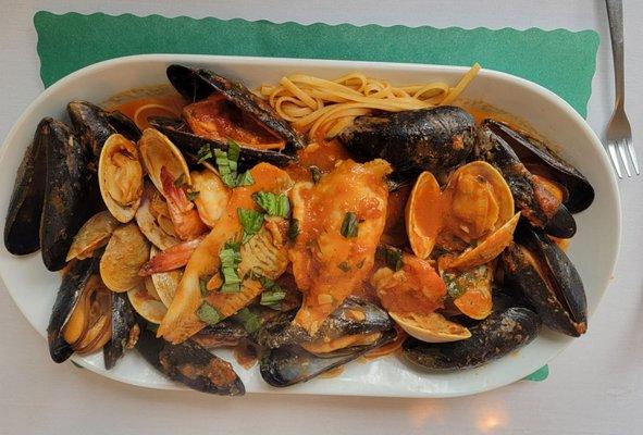 Linguini with red sauce and seafood