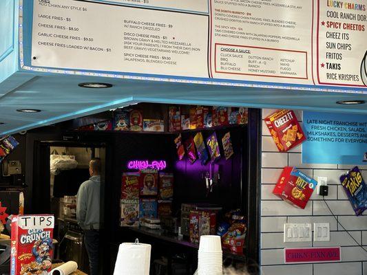 back counter area adorned with all the boxes & bags of fixin's you can put in your chicken breading.