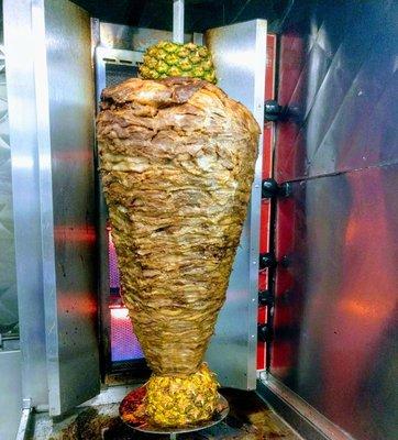 Fresh trompo al pastor, grilled and juicy!