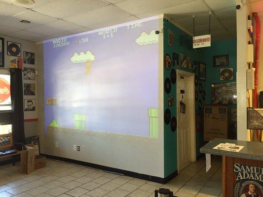 Super Mario Bros video playing on the projector. :)