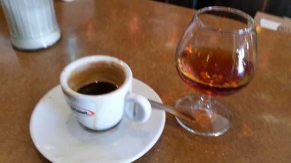 A bica and Crofts Brandy digestivo.