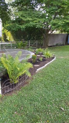 Until we rearranged some plants, added some mulch and now they have people over to enjoy their patio