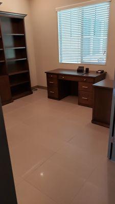 Desk and file cabinet.