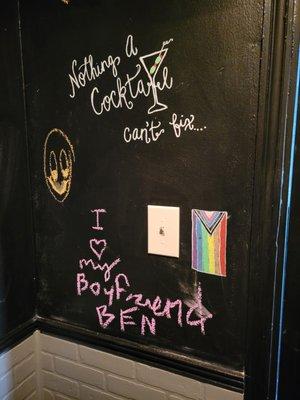 Leave your mark on our chalkboard walls in the unisex bathrooms.