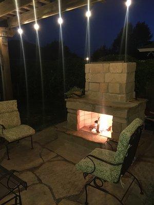 Patio, pergola and fireplace we built. Get the marshmallows ready.