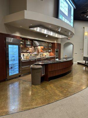 Demo room where chefs cook food and guests get to enjoy.