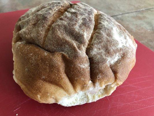 Boule of bread ready to be cut into slices