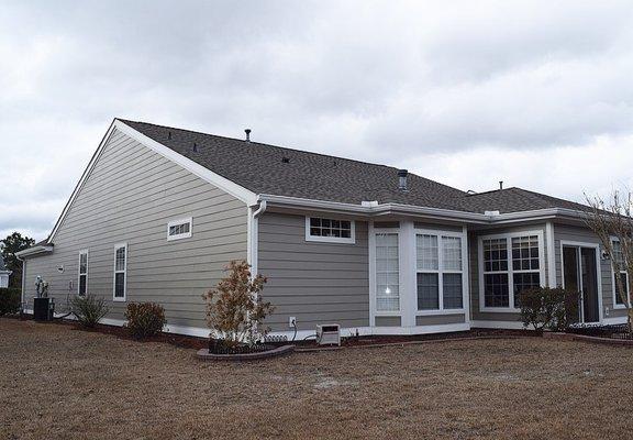 We replaced the original stucco on this home with James Hardie Color Plus siding. In addition we replaced the roof.