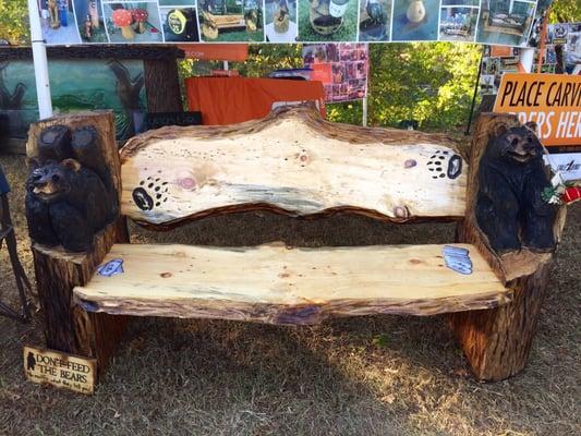 Lounging bear bench