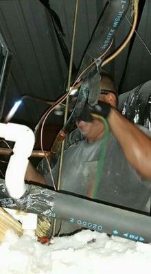 Joe Perez, owner welding in the heat. ..