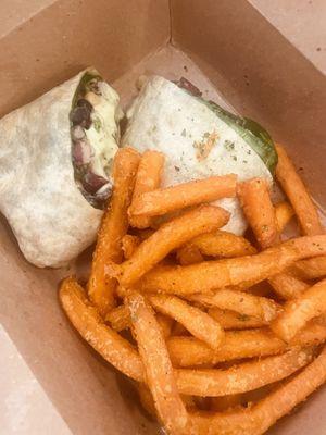 Vegan avocado black bean wrap with sweet potato fries.