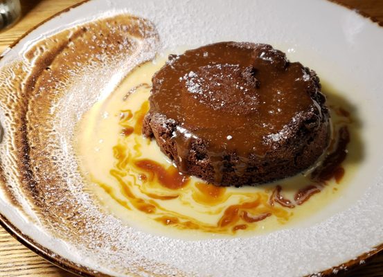 Molten chocolate lava cake ($12): salted caramel, creme anglaise, toasted marshmallow flourish. Decadent.