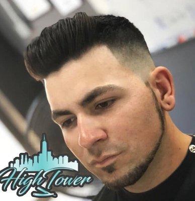 Mid fade with pompadour top